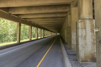 Scenic Road Through Canadian Landscape in Alberta - 001