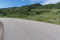 Scenic Road through Colorado's Green Hills in Deer Creek Canyon Park