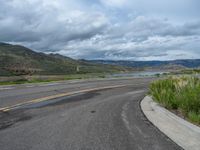 Scenic Road in Colorado: A Landscape Leading to a Lake