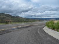 Scenic Road in Colorado: A Landscape Leading to a Lake