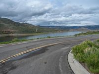 Scenic Road in Colorado: A Landscape Leading to a Lake