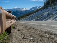 Scenic Road in Colorado: Snow-Covered Trees and Majestic Mountains