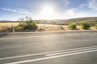 Scenic Road through Grassy Plains under African Sky 003