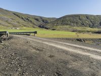 Scenic Road Through Icelandic Highlands with Mountain Landscape