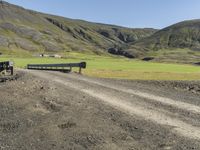 Scenic Road Through Icelandic Highlands with Mountain Landscape