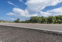 Scenic Road with Lush Landscape and Clear Sky