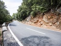 Scenic Road through Lush Spanish Landscape