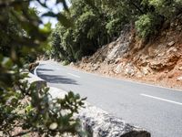 Scenic Road through Lush Spanish Landscape
