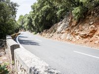 Scenic Road through Lush Spanish Landscape