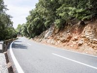 Scenic Road through Lush Spanish Landscape