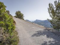 Scenic Road in Mallorca with Mountains and Ocean Views