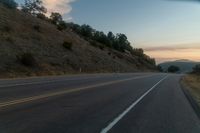 Scenic Road Through Mountain Landscape at Dawn