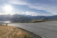 Scenic Road in New Zealand with Stunning Mountain View at Dawn