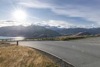 Scenic Road in New Zealand with Stunning Mountain View at Dawn