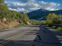 Scenic Road in Rural Colorado: Surrounded by Aspen Trees