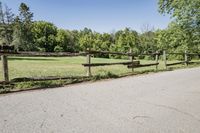 Scenic Road in Suburban Estate with Clear Sky