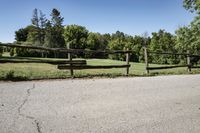 Scenic Road in Suburban Estate with Clear Sky