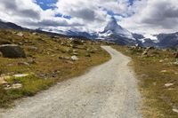 the trail is not as long or far down from the base as the snowcapped mountains