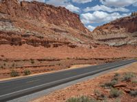 A Scenic Road in the USA: Clear Skies and Fluffy Clouds