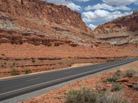 A Scenic Road in the USA: Clear Skies and Fluffy Clouds