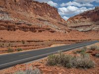 A Scenic Road in the USA: Clear Skies and Fluffy Clouds