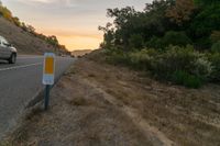 an empty road with a sign in front of it that reads get on the highway