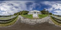 a photo of a house is seen in the image in this panoramic shot