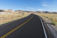 Scenic Utah: Asphalt Road Through Mountainous Desert