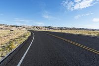 Scenic Utah: Asphalt Road Through Mountainous Desert