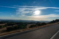 Scenic View of Highland Landscape with Trees and Sunlight