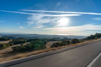 Scenic View of Highland Landscape with Trees and Sunlight