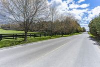 Scenic View of Rural Ontario, Canada: Vibrant Vegetation and a Split-Rail Fence