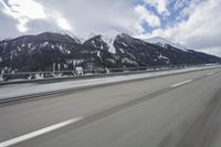 Scenic winter landscape of Germany's Alps with snowy mountains and highway