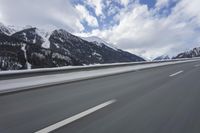Scenic winter landscape of Germany's Alps with snowy mountains and highway