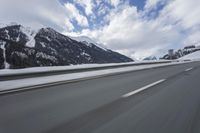 Scenic winter landscape of Germany's Alps with snowy mountains and highway