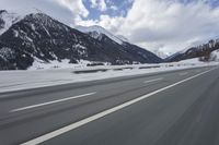 Scenic winter landscape of Germany's Alps with snowy mountains and highway