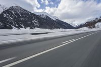 Scenic winter landscape of Germany's Alps with snowy mountains and highway