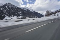 Scenic winter landscape of Germany's Alps with snowy mountains and highway