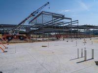 the construction site at the school is being constructed with metal rods and poles as they sit next to the open air