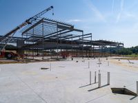 the construction site at the school is being constructed with metal rods and poles as they sit next to the open air