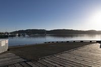 Serene Landscape at Dawn with Clear Sky over Lake