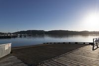 Serene Landscape at Dawn with Clear Sky over Lake