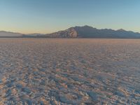 Serene Landscape of Salt Lake: Mountains Against Dark Night