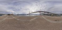 an intersection view in the middle of a lake with a bridge on the opposite bank