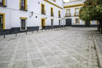Seville, Spain: A Charming Street with Cobblestone Roads