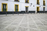 Seville, Spain: A Charming Street with Cobblestone Roads