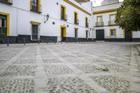 Seville, Spain: A Charming Street with Cobblestone Roads