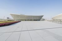 some buildings on an outdoor with no people or people around them in the sun and in blue sky