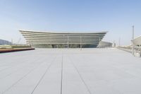 some buildings on an outdoor with no people or people around them in the sun and in blue sky