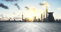 a city skyline with a view of skyscrapers and a sun rising over the ground